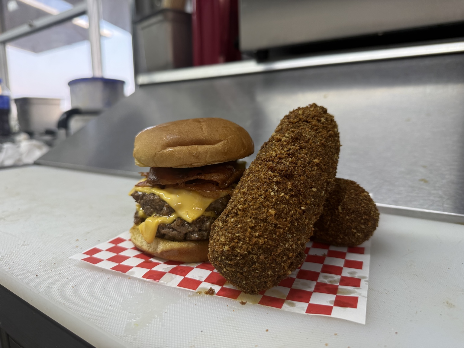 Double beef burger with cave sticks from a different angle