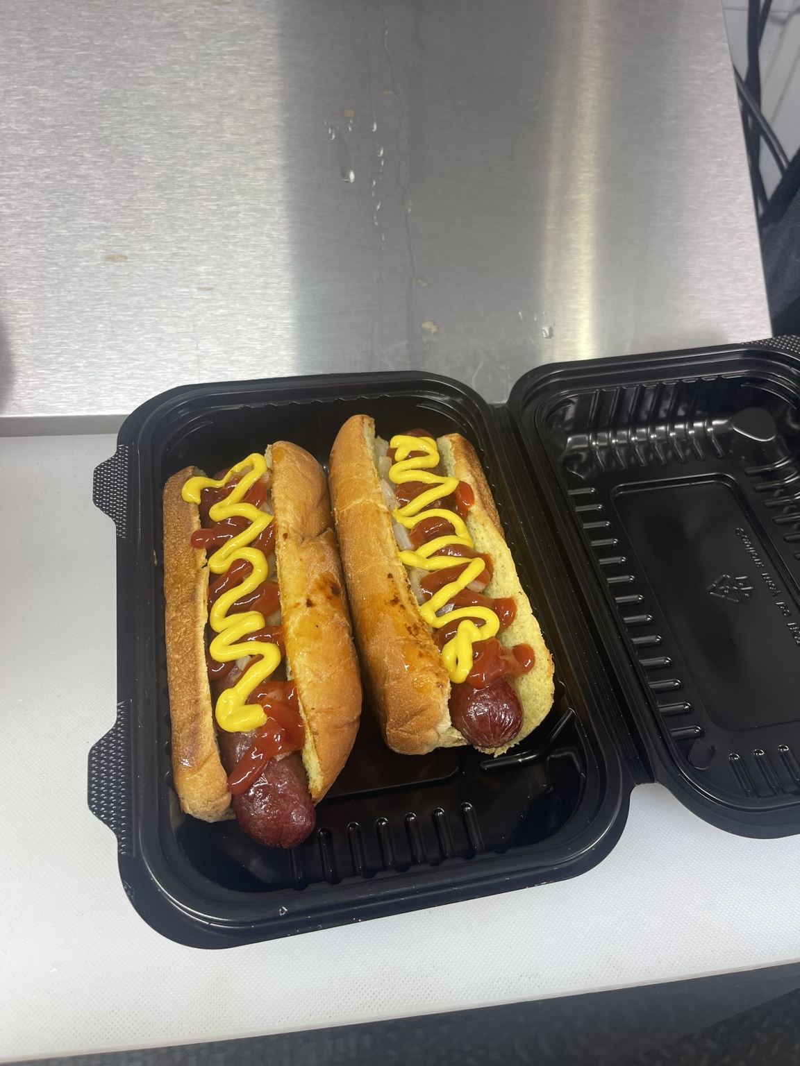 Real Sear N Sizzle hot dogs with ketchup and mustard